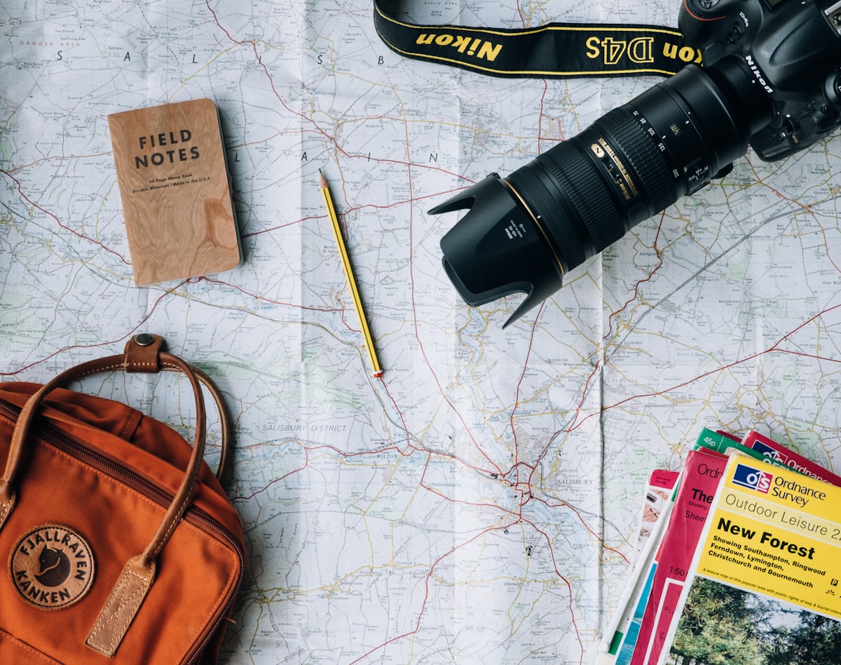 Traveler with map and camera